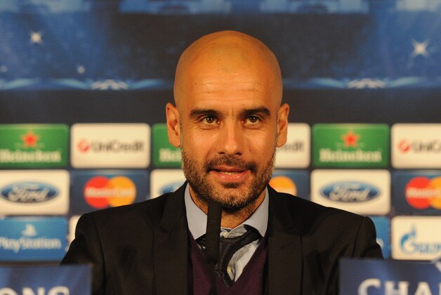 LONDON, ENGLAND - FEBRUARY 18:  FC Bayern Muenchen coach Pep Guardiola talks to the media during a press conference at the Landmark Hotel on February 18, 2014 in London, England.  (Photo by Shaun Botterill/Getty Images)
