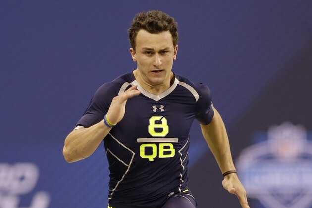 Texas A&M quarterback Johnny Manziel runs a drill at the NFL football scouting combine in Indianapolis, Sunday, Feb. 23, 2014. (AP Photo/Nam Y. Huh)