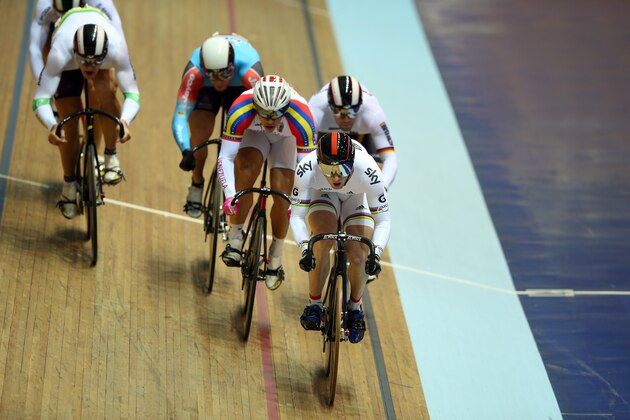MANCHESTER, ENGLAND - NOVEMBER 02:  Jason Kenny (C) of Great Britain on his way to winning the Men's Keirin heat on day two of the UCI Track Cycling World Cup at Manchester Velodrome on November 2, 2013 in Manchester, England.  (Photo by Bryn Lennon/Getty Images)
