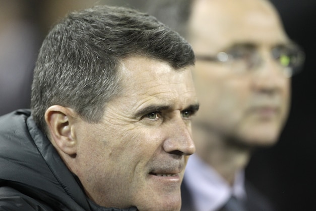 Republic of Ireland assistant manager Roy Keane, left, and manager Martin O'Neill, right, watch their team play against Latvia during a soccer International at the Aviva Stadium, Dublin, Ireland, Friday, Nov. 15, 2013.  (AP Photo/Peter Morrison)