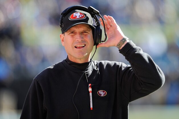 CHARLOTTE, NC - JANUARY 12: Head coach Jim Harbaugh of the San Francisco 49ers looks ok from the sideline in the second quarter against the Carolina Panthers during the NFC Divisional Playoff Game at Bank of America Stadium on January 12, 2014 in Charlotte, North Carolina.  (Photo by Grant Halverson/Getty Images)