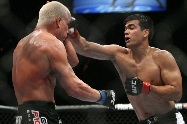 Lyoto Machida of Brazil, right, exchanges blows with Tito Ortiz during their UFC Light Heavyweight match at the MGM Grand Garden Arena Saturday, May 24, 2008 in Las Vegas. (AP Photo/Eric Jamison)