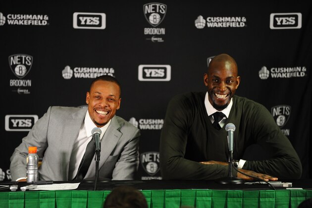 BOSTON, MA - JANUARY 26: Paul Pierce #34 and Kevin Garnett #2 of the Brooklyn Nets speak to the media after the game against the Boston Celtics on January 26, 2014 at the TD Garden in Boston, Massachusetts.  NOTE TO USER: User expressly acknowledges and agrees that, by downloading and or using this photograph, User is consenting to the terms and conditions of the Getty Images License Agreement. Mandatory Copyright Notice: Copyright 2014 NBAE  (Photo by Steve Babineau/NBAE via Getty Images)