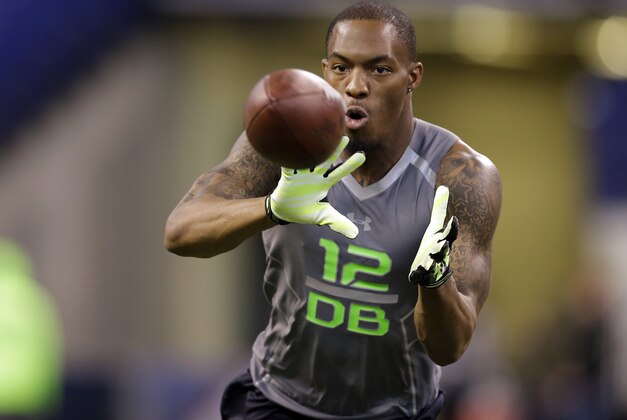 Alabama defensive back Ha Ha Clinton-Dix makes a catch during drill at the NFL football scouting combine in Indianapolis, Tuesday, Feb. 25, 2014. (AP Photo/Michael Conroy)