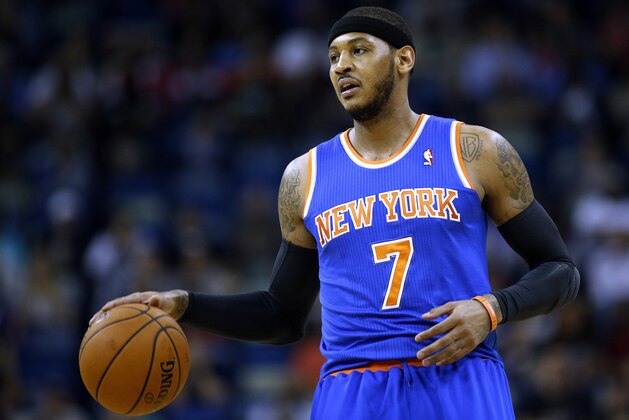 New York Knicks small forward Carmelo Anthony (7) drives with the ball during the first quarter of an NBA basketball game against the New Orleans Pelicans in New Orleans, Wednesday, Feb. 19, 2014. (AP Photo/Jonathan Bachman)