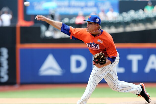 NEW YORK, NY - JULY 14:  Noah Syndergaard #45 of the United States team delivers a pitch to the World team in the first inning on July 14, 2013 at Citi Field in the Flushing neighborhood of the Queens borough of New York City. The United States defeated the World Team 4-2.  (Photo by Elsa/Getty Images)