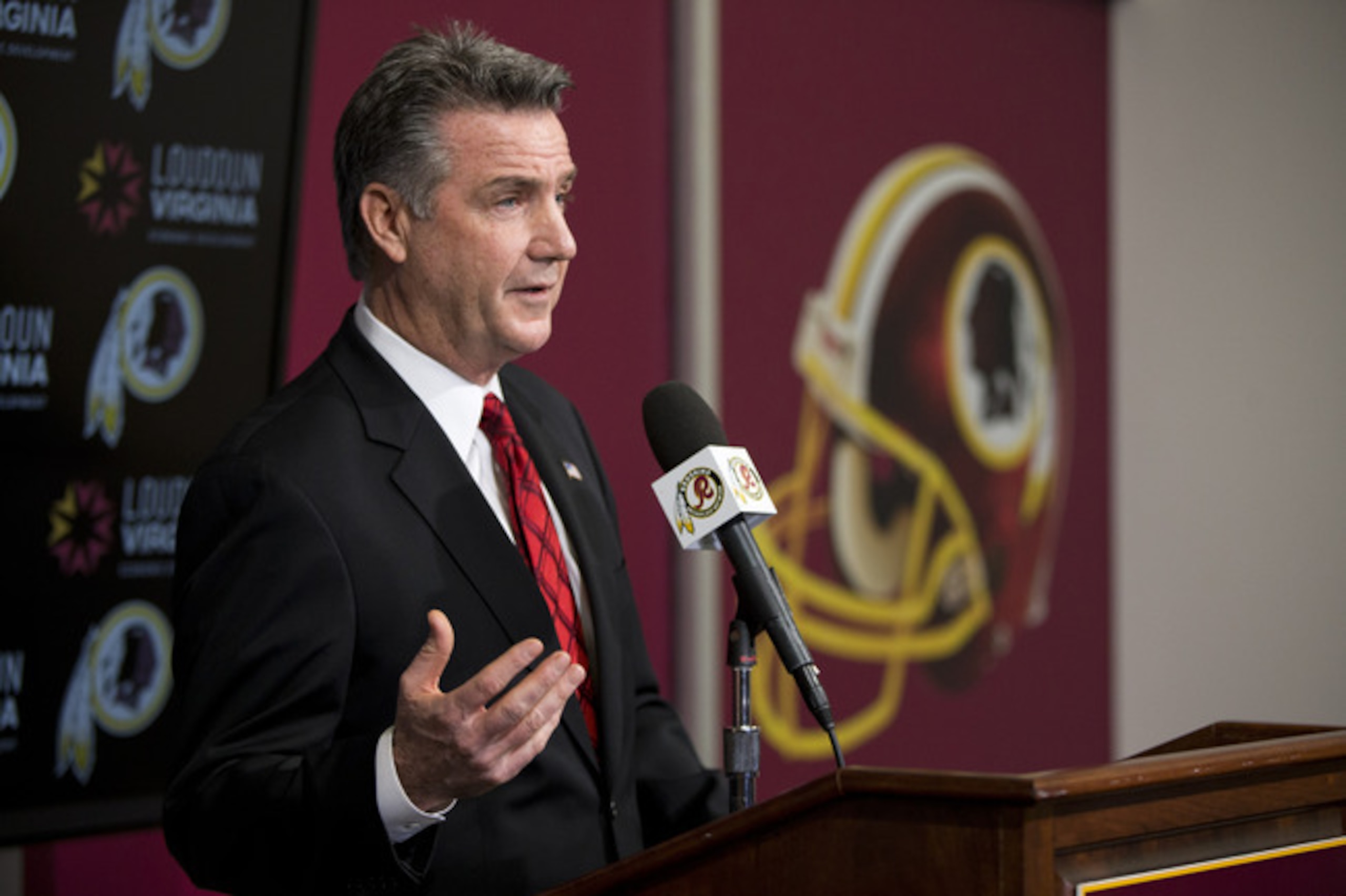 Washington Redskins Executive Vice President/ General Manager Bruce Allen answers a question during a news conference after the firing of head coach Mike Shanahan at Redskins Park on Monday, Dec. 30, 2013, in Ashburn, Va. (AP Photo/ Evan Vucci)