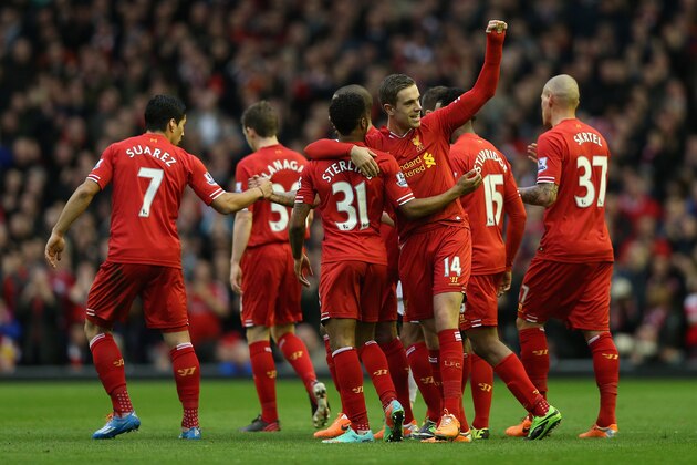 LIVERPOOL, ENGLAND - FEBRUARY 23:  Jordan Henderson of Liverpool celebrates scoring the second goal with his team-mates during the Barclays Premier League match between Liverpool and Swansea City at Anfield on February 23, 2014 in Liverpool, England.  (Photo by Clive Brunskill/Getty Images)