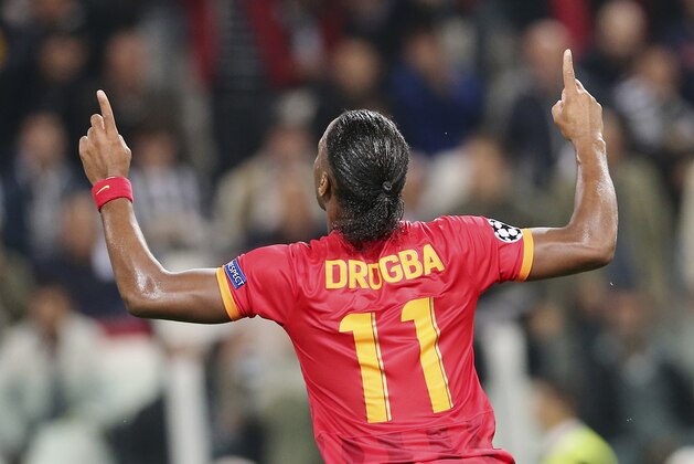 Galatasaray forward Didier Drogba, of Ivory Coast, celebrates after scoring during a Champions League, Group B, soccer match between Juventus and Galatasaray at the Juventus stadium in Turin, Italy, Wednesday, Oct. 2, 2013. (AP Photo/Antonio Calanni)