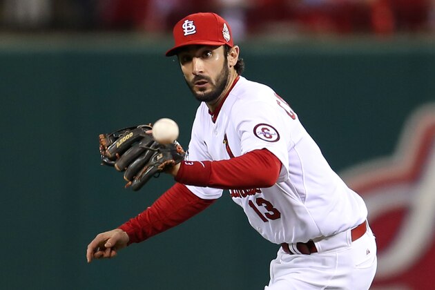 ST LOUIS, MO - OCTOBER 28:  Matt Carpenter #13 of the St. Louis Cardinals fields a single hit by Xander Bogaerts #72 of the Boston Red Sox in the fifth inning of Game Five of the 2013 World Series at Busch Stadium on October 28, 2013 in St Louis, Missouri.  (Photo by Rob Carr/Getty Images)