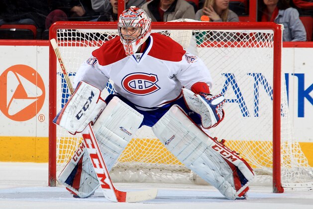 RALEIGH, NC - FEBRUARY 08: Carey Price #31 of the Montreal Canadiens crouches in the crease to defend the net during their NHL game against the against the Carolina Hurricanes at PNC Arena on February 8, 2014 in Raleigh, North Carolina.  (Photo by Gregg Forwerck/NHLI via Getty Images)