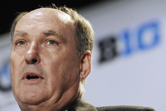 FILE - In this July 28, 2011, file photo, Big Ten Commissioner Jim Delany speaks to reporters during the Big Ten NCAA college football media day in Chicago. The Chronicle of Higher Education is reporting Thursday, July 19, 2012, that the Big Ten is considering a plan to give its commissioner the power to fire coaches in the wake of the Penn State child sex-abuse scandal. An 18-page plan being circulated among Big Ten leadership would include giving Delany the authority to levy sanctions including financial penalties, suspensions and termination of a school employee. (AP Photo/Paul Beaty, File)