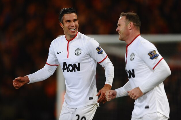 LONDON, ENGLAND - FEBRUARY 22:  Robin Van Persie of Manchester United celebrates the first goal with Wayne Rooney during the Barclays Premier League match between Crystal Palace and Manchester United at Selhurst Park on February 22, 2014 in London, England.  (Photo by Laurence Griffiths/Getty Images)