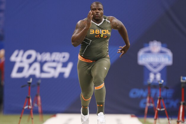 Feb 22, 2014; Indianapolis, IN, USA; Auburn Tigers offensive lineman Greg Robinson runs the 40 yard dash during the 2014 NFL Combine at Lucas Oil Stadium. Mandatory Credit: Brian Spurlock-USA TODAY Sports