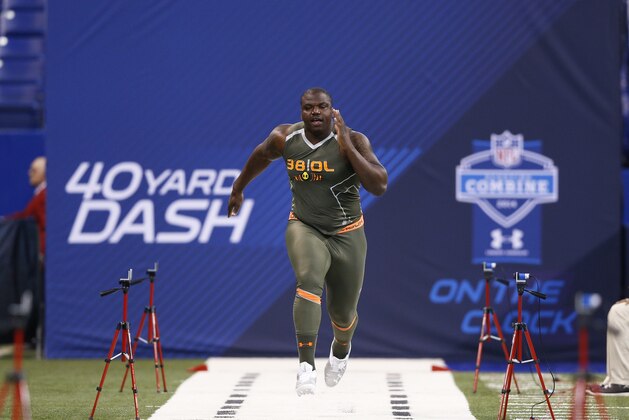 INDIANAPOLIS, IN - FEBRUARY 22: Former Auburn offensive lineman Greg Robinson runs the 40-yard dash during the 2014 NFL Combine at Lucas Oil Stadium on February 22, 2014 in Indianapolis, Indiana. (Photo by Joe Robbins/Getty Images)