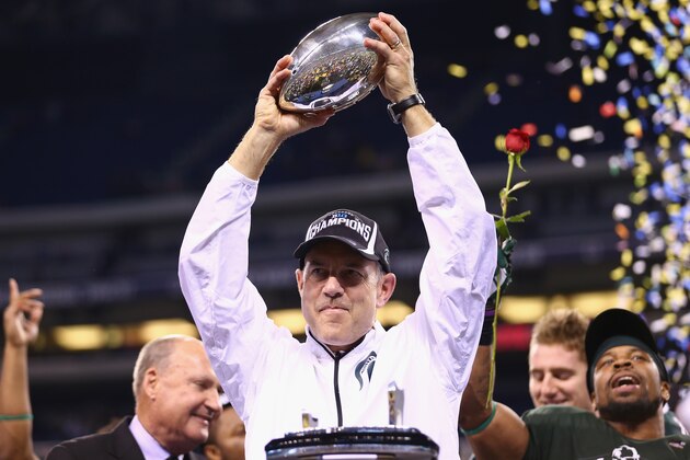 INDIANAPOLIS, IN - DECEMBER 07: Mark Dantonio the head coach of the Michigan State Spartans holds the champions trophy after Michigan State beat Ohio State Buckeyes 34-24 in the Big Ten Championship at Lucas Oil Stadium on December 7, 2013 in Indianapolis, Indiana. (Photo by Andy Lyons/Getty Images) INDIANAPOLIS, IN - DECEMBER 07: Mark Dantonio the head coach of the Michigan State Spartans holds the champions trophy after Michigan State beat Ohio State Buckeyes 34-24 in the Big Ten Championship at Lucas Oil Stadium on December 7, 2013 in Indianapolis, Indiana. (Photo by Andy Lyons/Getty Images)