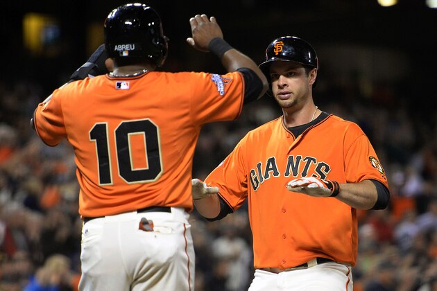 SAN FRANCISCO, CA - SEPTEMBER 27:  Brandon Belt #9 of the San Francisco Giants is congratulated by Tony Abreu #10 after hitting a two-run home run during the third inning against the San Diego Padres at AT&T Park on September 27, 2013 in San Francisco, California.  (Photo by Thearon W. Henderson/Getty Images)