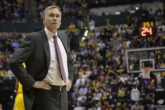 Los Angeles Lakers head coach Mike D'Antoni looks in the direction of the scoreboard while playing the Indiana Pacers during the second half of an NBA basketball game in Indianapolis, Tuesday, Feb. 25, 2014. The Pacers won 118-98. (AP Photo/AJ Mast)