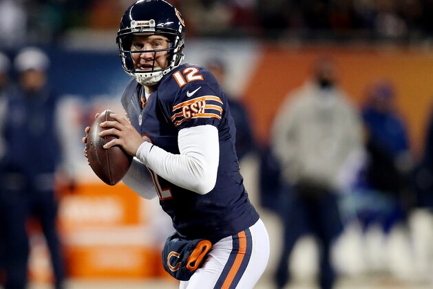 CHICAGO, IL - DECEMBER 09: Quarterback Josh McCown #12 of the Chicago Bears looks to pass against the Dallas Cowboys during a game at Soldier Field on December 9, 2013 in Chicago, Illinois. (Photo by Jonathan Daniel/Getty Images) CHICAGO, IL - DECEMBER 09: Quarterback Josh McCown #12 of the Chicago Bears looks to pass against the Dallas Cowboys during a game at Soldier Field on December 9, 2013 in Chicago, Illinois. (Photo by Jonathan Daniel/Getty Images)
