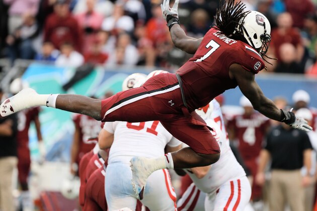 ORLANDO, FL - JANUARY 01:  Jadeveon Clowney #7 of the South Carolina Gamecocks in action during their game against the Wisconsin Badgers at the Capital One Bowl on January 1, 2014 in Orlando, Florida.  (Photo by Scott Halleran/Getty Images)