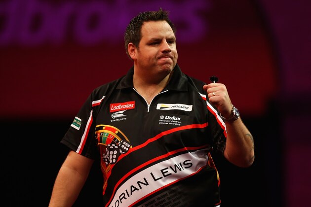 LONDON, ENGLAND - DECEMBER 28:  Adrian Lewis of England celebrates winning a set during his third round match against Mervyn King of England on day thirteen of the Ladbrokes.com World Darts Championship at Alexandra Palace on December 28, 2013 in London, England.  (Photo by Harry Engels/Getty Images)