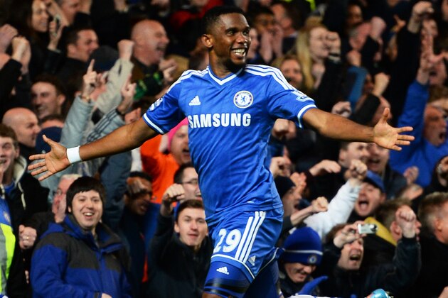 LONDON, ENGLAND - JANUARY 19:  Samuel Eto'o of Chelsea celebrates after scoring his team's third goal and completing his hat trick during the Barclays Premier League match between Chelsea and Manchester United at Stamford Bridge on January 19, 2014 in London, England.  (Photo by Mike Hewitt/Getty Images)