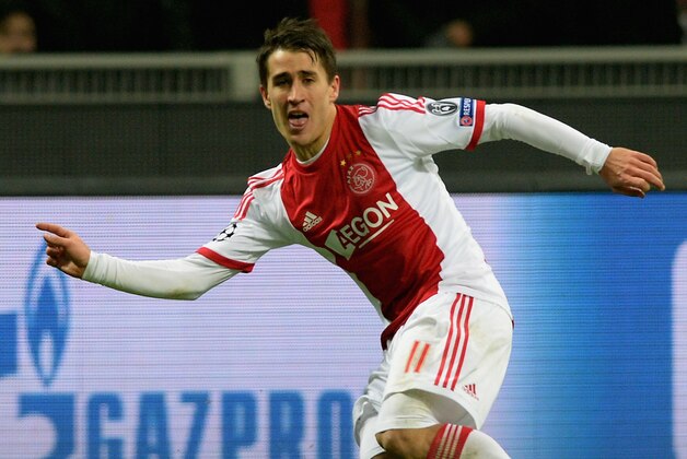 MILAN, ITALY - DECEMBER 11:  Bojan Krkic of Ajax Amsterdam in action during the UEFA Champions League Group H match between AC Milan and Ajax Amsterdam at Stadio Giuseppe Meazza on December 11, 2013 in Milan, Italy.  (Photo by Claudio Villa/Getty Images)