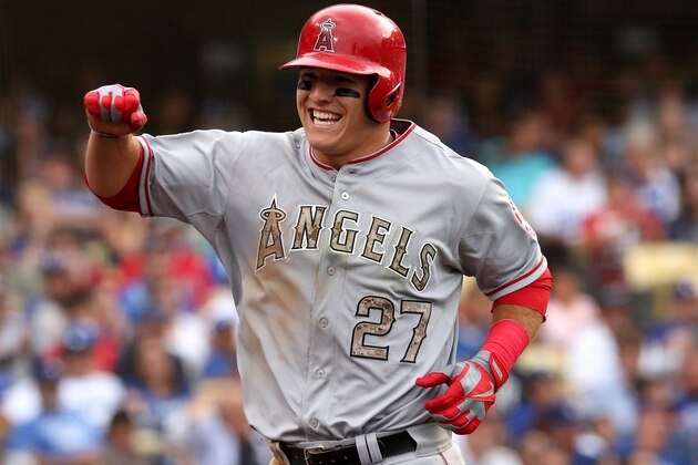 LOS ANGELES, CA - MAY 27:  Mike Trout #27 of the Los Angeles Angels of Anaheim celebrates after scoring a run in the fourth inning against the Los Angeles Dodgers at Dodger Stadium on May 27, 2013 in Los Angeles, California.  (Photo by Stephen Dunn/Getty Images)