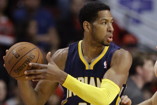 Indiana Pacers forward Danny Granger (33) looks to a pass as Chicago Bulls guard Mike Dunleavy (34) guards during the first half of an NBA preseason basketball game in Chicago on Friday, Oct. 18, 2013. (AP Photo/Nam Y. Huh)