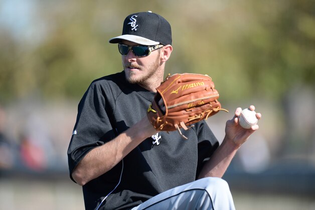 Feb 24, 2014; Glendale, AZ, USA; Chicago White Sox starting pitcher Chris Sale (49) throws during a workout at Camelback Ranch. Mandatory Credit: Joe Camporeale-USA TODAY Sports