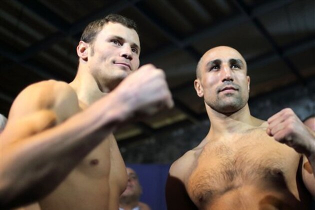 WBO Super middleweight champion, German  Arthur Abraham , right, and his challenger  Robert Stieglitz pose at the weighing in Magdeburg, eastern Germany, Friday March 22, 2013. The title bout is scheduled for Saturday evening. (AP Photo/dpa,Jens Wolf)