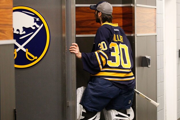 BUFFALO, NY - JANUARY 21: Ryan Miller #30 of the Buffalo Sabres walks into the locker room before playing the Florida Panthers on January 21, 2014 at the First Niagara Center in Buffalo, New York.  (Photo by Bill Wippert/NHLI via Getty Images)