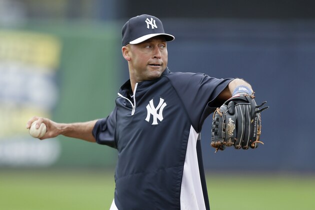 New York Yankees shortstop Derek Jeter warms up before an exhibition baseball game against the Pittsburgh Pirates Thursday, Feb. 27, 2014, in Tampa, Fla. (AP Photo/Charlie Neibergall)