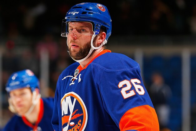 UNIONDALE, NY - JANUARY 27:  Thomas Vanek #26 of the New York Islanders skates against the Boston Bruins at Nassau Veterans Memorial Coliseum on January 27, 2014 in Uniondale, New York. The Bruins defeated the Islanders 6-3.  (Photo by Mike Stobe/NHLI via Getty Images)
