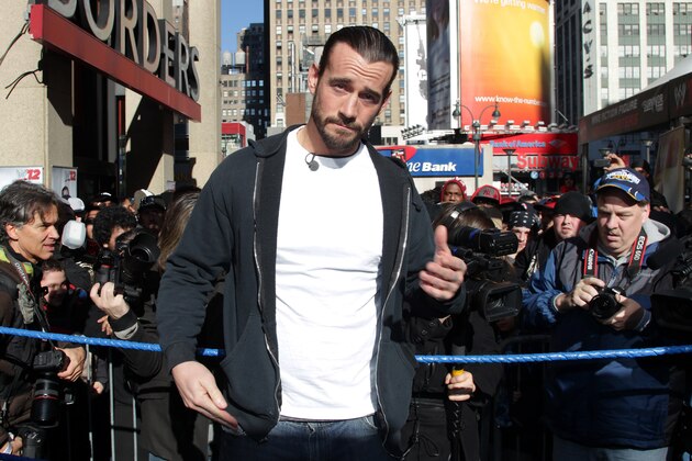 WWE Superstar CM Punk poses at Madison Square Garden, Friday, Nov. 18, 2011, in New York, during a rally leading up to the 25th Anniversary of Survivor Series, taking place Sunday at Madison Square Garden.  The event will feature actor and wrestling favorite Dwayne