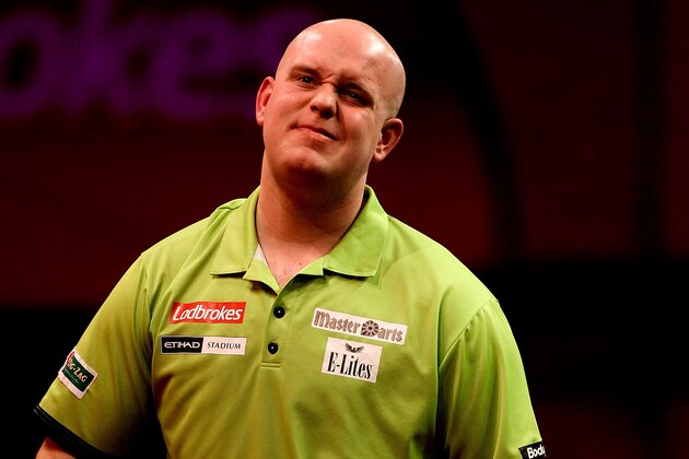 LONDON, ENGLAND - JANUARY 01: Michael van Gerwen of The Netherlands reacts during the final of the Ladbrokes.com World Darts Championships against Peter Wright of Scotland at Alexandra Palace on January 1, 2014 in London, England.  (Photo by Ben Hoskins/Getty Images)
