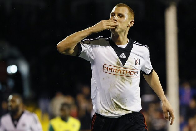 Fulham's Steve Sidwell celebrates scoring a goal during the English FA Cup 3rd round replay soccer match between Fulham and Norwich City at Craven Cottage stadium in London, Tuesday, Jan. 14, 2014. (AP Photo/Kirsty Wigglesworth) Fulham's Steve Sidwell celebrates scoring a goal during the English FA Cup 3rd round replay soccer match between Fulham and Norwich City at Craven Cottage stadium in London, Tuesday, Jan. 14, 2014. (AP Photo/Kirsty Wigglesworth)