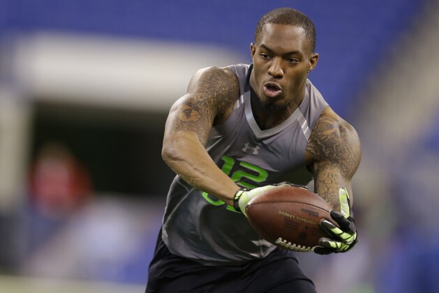 Alabama defensive back Ha Ha Clinton-Dix runs a drill at the NFL football scouting combine in Indianapolis, Tuesday, Feb. 25, 2014. (AP Photo/Michael Conroy)