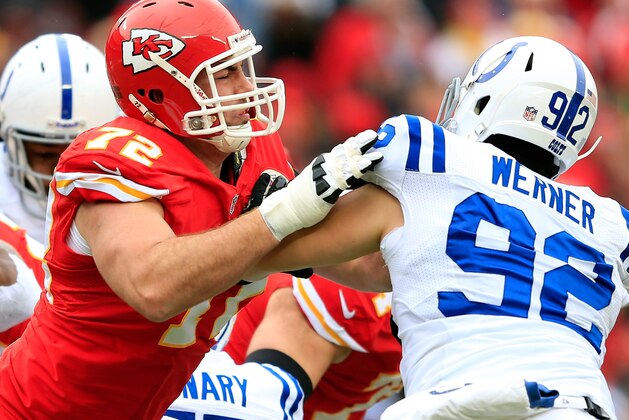 KANSAS CITY, MO - DECEMBER 22:  Offensive tackle Eric Fisher #72 of the Kansas City Chiefs block outside linebacker Bjoern Werner #92 of the Indianapolis Colts during the game at Arrowhead Stadium on December 22, 2013 in Kansas City, Missouri.  (Photo by Jamie Squire/Getty Images)