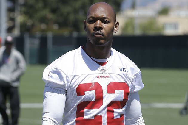 San Francisco 49ers cornerback Carlos Rogers (22) walks off the practice field at an NFL football training camp in Santa Clara, Calif., Wednesday, May 22, 2013. (AP Photo/Jeff Chiu)