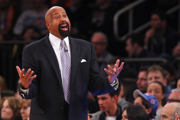 NEW YORK, NY - FEBRUARY 1: Head coach Mike Woodson  of the New York Knicks yells to a ref during the second half of a game against the Miami Heat at Madison Square Garden on February. 1, 2014 in New York City. The Heat defeated the Knicks 106-91. NOTE TO USER: User expressly acknowledges and agrees that, by downloading and/or using this Photograph, user is consenting to the terms and conditions of the Getty Images License Agreement. (Photo by Rich Schultz /Getty Images)