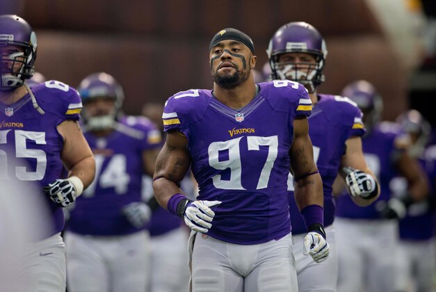 Dec 15, 2013; Minneapolis, MN, USA; Minnesota Vikings defensive end Everson Griffen (97) runs onto the field to play the Philadelphia Eagles at Mall of America Field at H.H.H. Metrodome. The Vikings win 48-30. Mandatory Credit: Bruce Kluckhohn-USA TODAY Sports