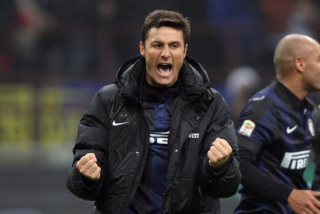 MILAN, ITALY - DECEMBER 22:  Javier Zanetti of FC Inter Milan celebrates victory at the end of the Serie A match between FC Internazionale Milano and AC Milan at San Siro Stadium on December 22, 2013 in Milan, Italy.  (Photo by Claudio Villa/Getty Images)
