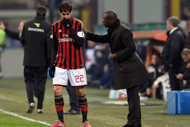 MILAN, ITALY - JANUARY 22:  Head coach AC Milan Clarence Seedorf speaks with Kaka #22 during the TIM Cup match between AC Milan and Udinese Calcio at Stadio Giuseppe Meazza on January 22, 2014 in Milan, Italy.  (Photo by Claudio Villa/Getty Images)