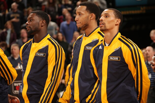 INDIANAPOLIS - FEBRUARY 25: Evan Turner #12 of the Indiana Pacers looks on during the National Anthem before the game against the Los Angeles Lakers at Bankers Life Fieldhouse on February 25, 2014 in Indianapolis, Indiana.  NOTE TO USER: User expressly acknowledges and agrees that, by downloading and or using this Photograph, user is consenting to the terms and condition of the Getty Images License Agreement. Mandatory Copyright Notice: 2014 NBAE  (Photo by Ron Hoskins/NBAE via Getty Images)