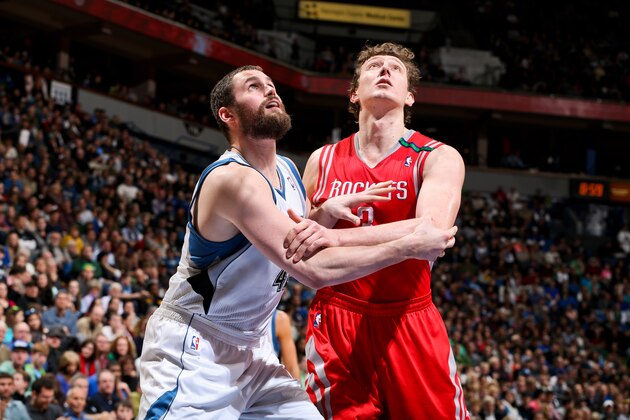 MINNEAPOLIS, MN - DECEMBER 26: Omer Asik #3 of the Houston Rockets battles for rebound position against Kevin Love #42 of the Minnesota Timberwolves on December 26, 2012 at Target Center in Minneapolis, Minnesota. NOTE TO USER: User expressly acknowledges and agrees that, by downloading and or using this photograph, user is consenting to the terms and conditions of the Getty Images License Agreement. Mandatory Copyright Notice: Copyright 2012 NBAE (Photo by David Sherman/NBAE via Getty Images)