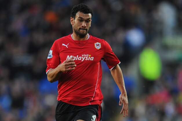 CARDIFF, WALES - JANUARY 11:  Cardiff player Steven Caulker in action during the Barclays Premier League match between Cardiff City and West Ham United at Cardiff City Stadium on January 11, 2014 in Cardiff, Wales.  (Photo by Stu Forster/Getty Images)