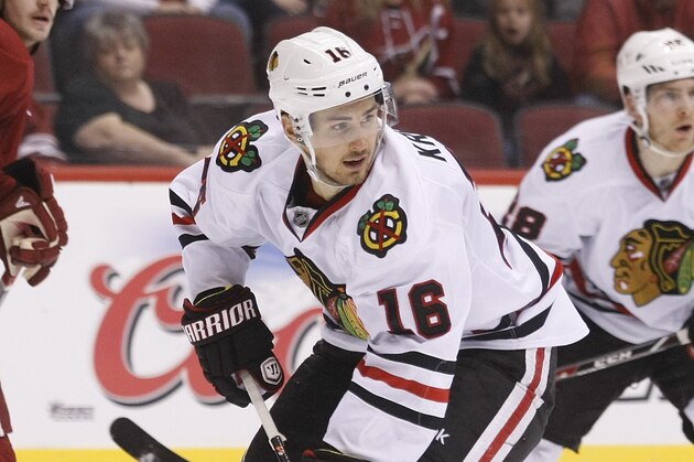 Chicago Blackhawks center Marcus Kruger (16) against the Phoenix Coyotes in the first period during an NHL hockey game on Saturday, Nov. 30, 2013, in Glendale, Ariz. (AP Photo/Rick Scuteri)