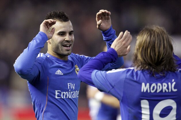 Real Madrid's Jese Rodriguez celebrates following their win against Valencia during their La Liga soccer match at the Mestalla stadium in Valencia, Spain, Sunday, Dec. 22, 2013. (AP Photo/Alberto Saiz)