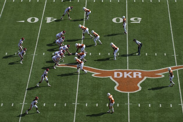 AUSTIN, TX - NOVEMBER 10: Steele Jantz #2 of the Iowa State Cyclones takes the snap near midfield during the Big 12 Conference game against the Texas Longhorns on November 10, 2012 at Darrell K Royal-Texas Memorial Stadium in Austin, Texas. The longhorn on the 50 yard line has the initials DKR for the former Texas Longhorns coach Darrell K Royal who passed away earlier this week. (Photo by Cooper Neill/Getty Images)